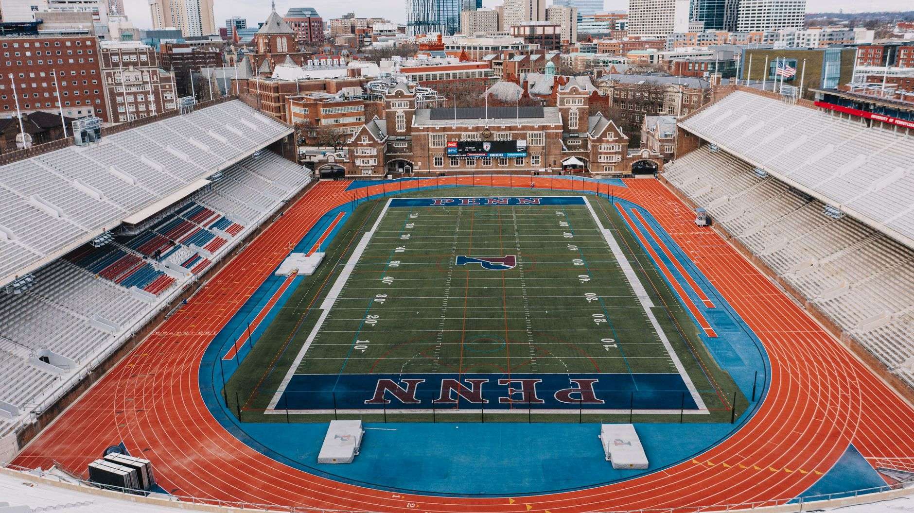 Aerial view of a college football stadium field and stands