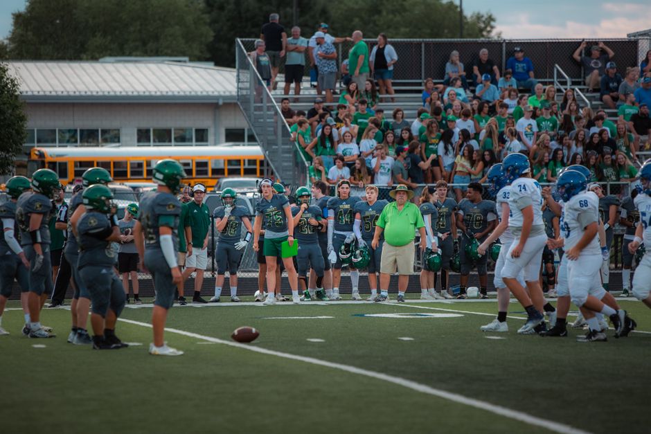 High school seniors at a football field on the first day of the school year