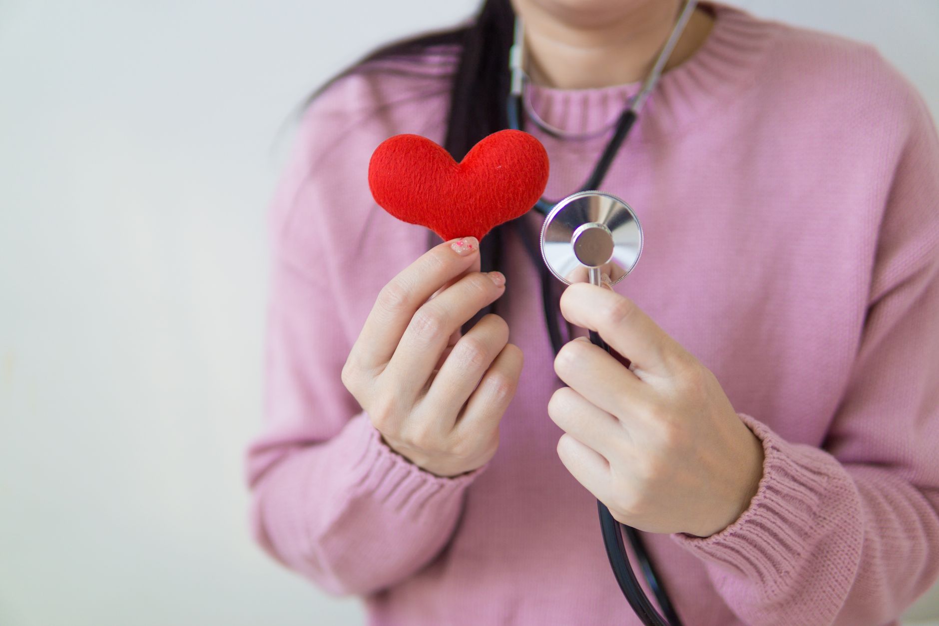 Red clothing and heart symbol marking a heart health awareness campaign