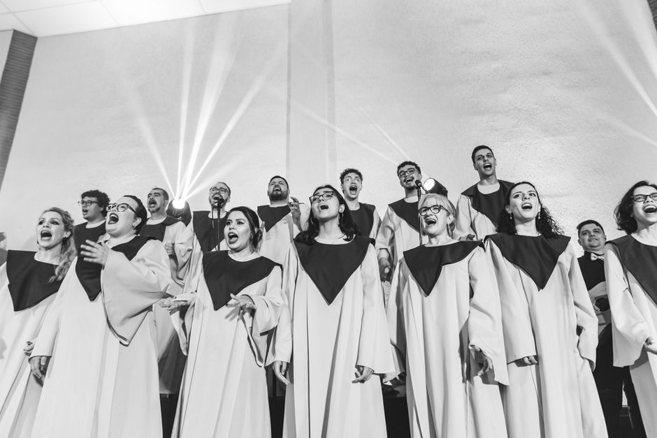 A historic church building hosting an anniversary celebration with a gospel concert