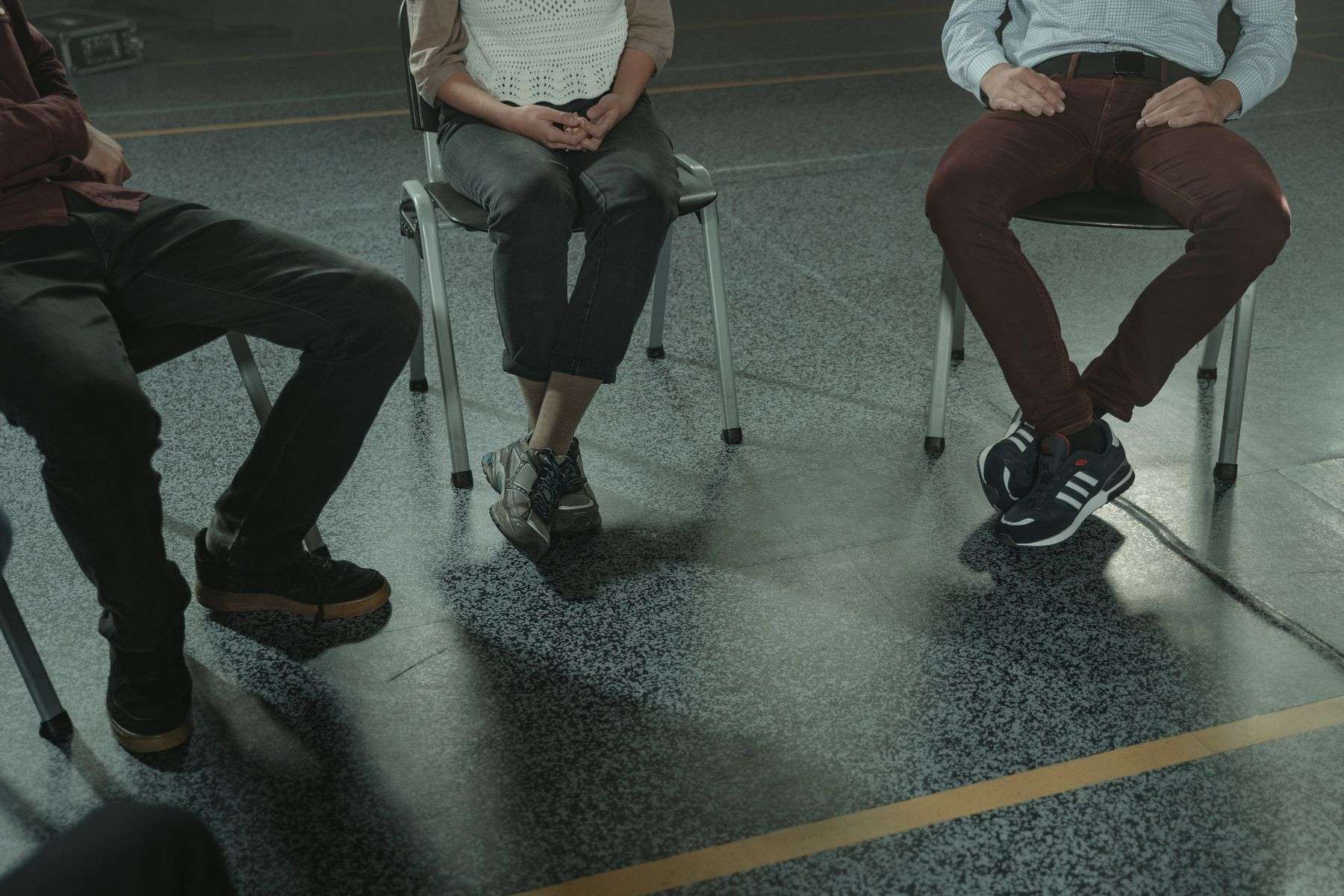 A small group of adults sitting together for a supportive conversation