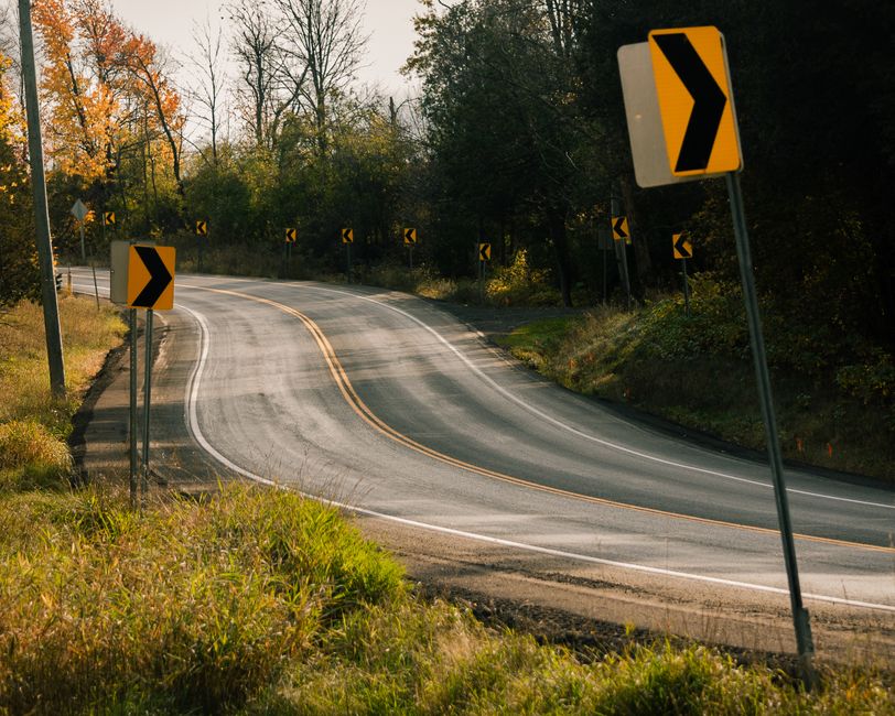 Rural two-lane road representative of Half Mile Road near Theodore
