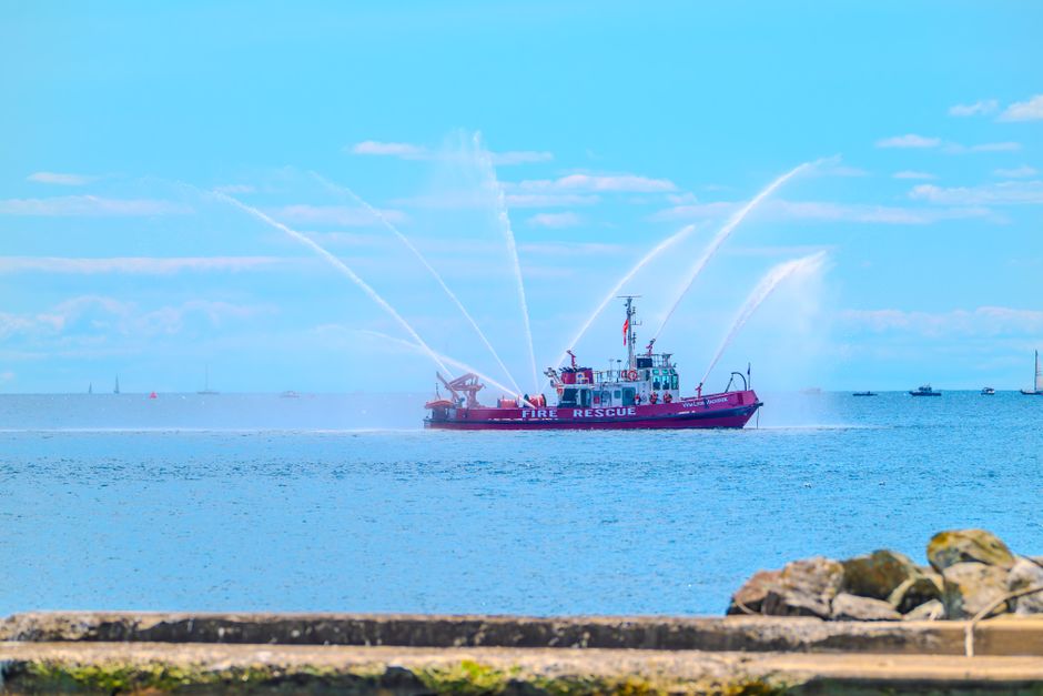 Coast Guard vessel responding near the Mobile ship channel after two boats sank