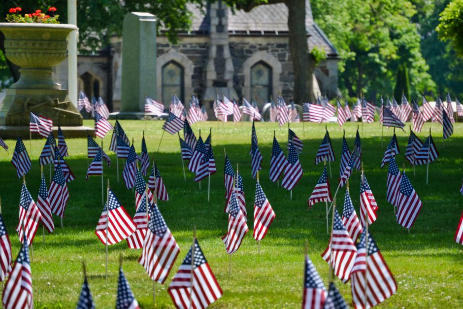 Rows of flags at a veterans memorial cemetery