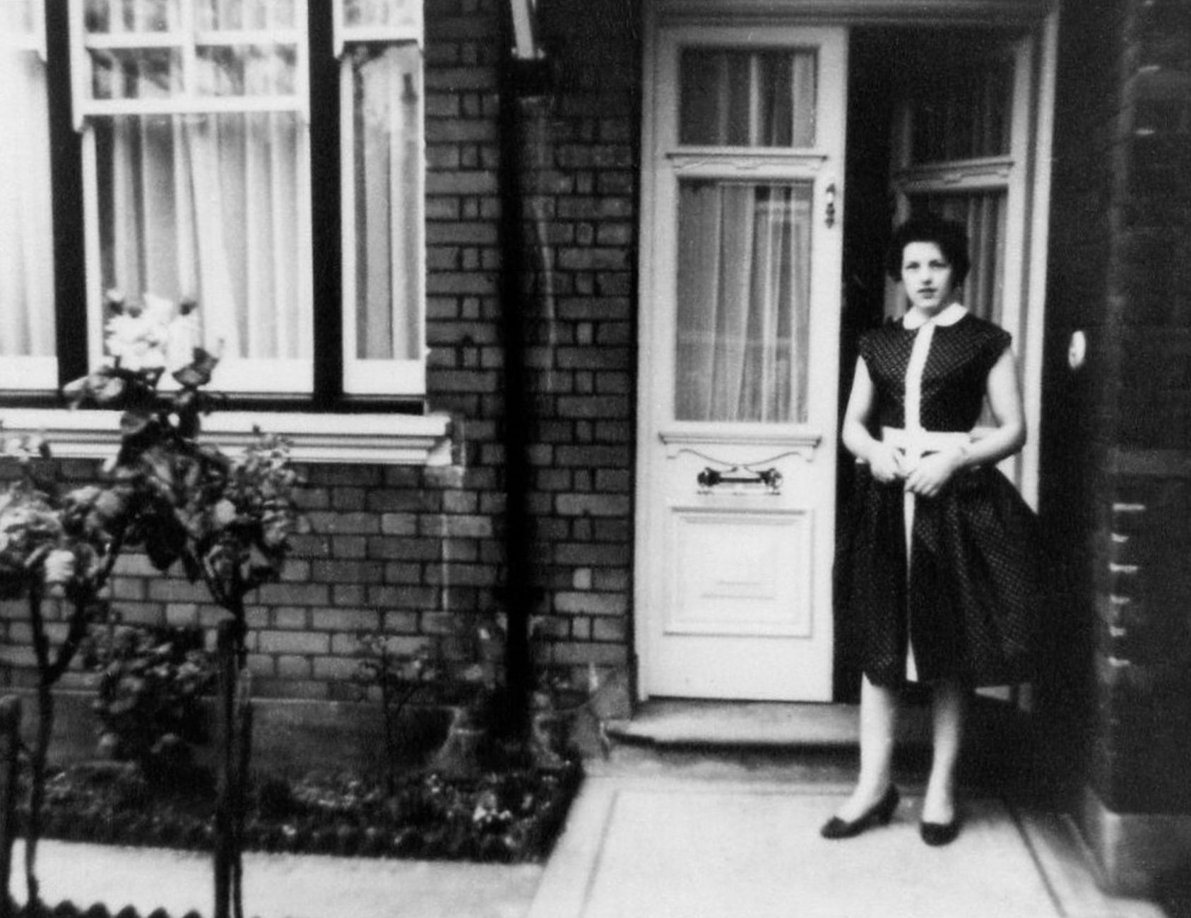 Vintage photograph of a front porch on an older home