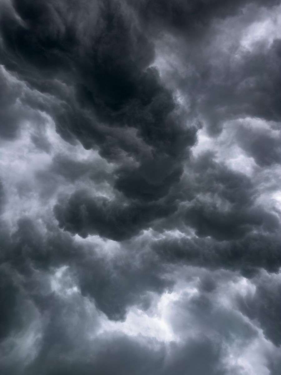 Dark storm clouds building in the sky ahead of thunderstorms