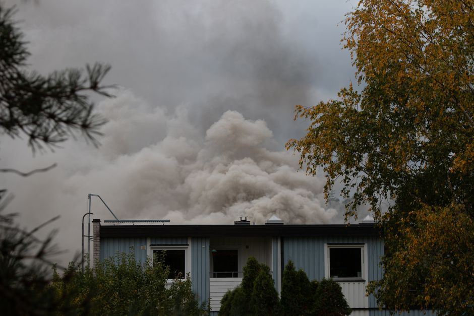 Firefighters at the scene of a house fire that destroyed a West Mobile home