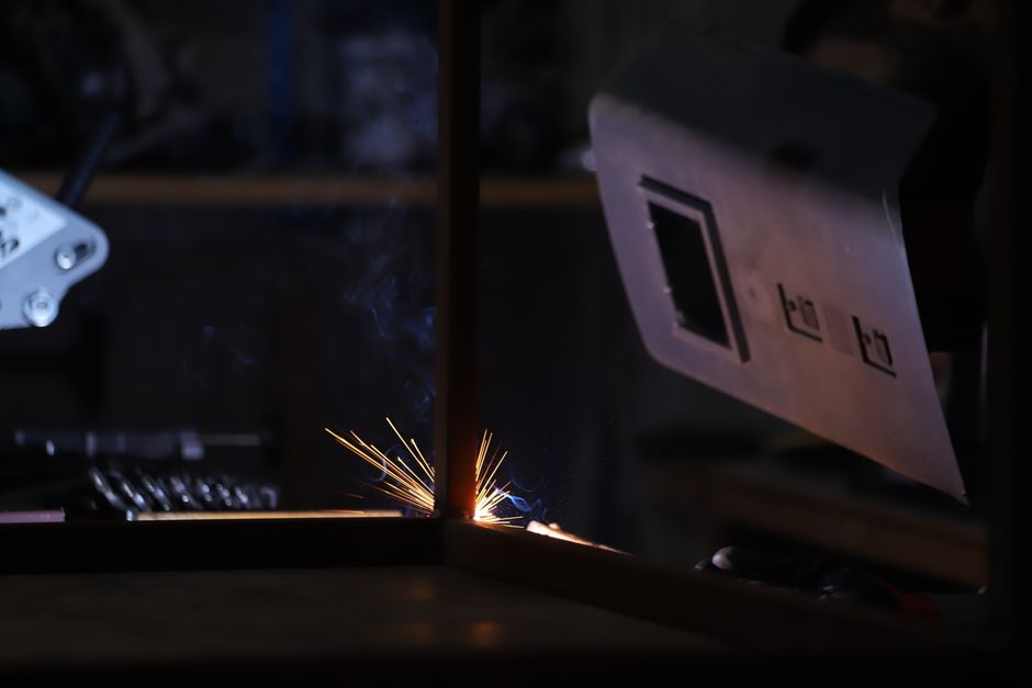 Welding sparks fly during a hands-on training session