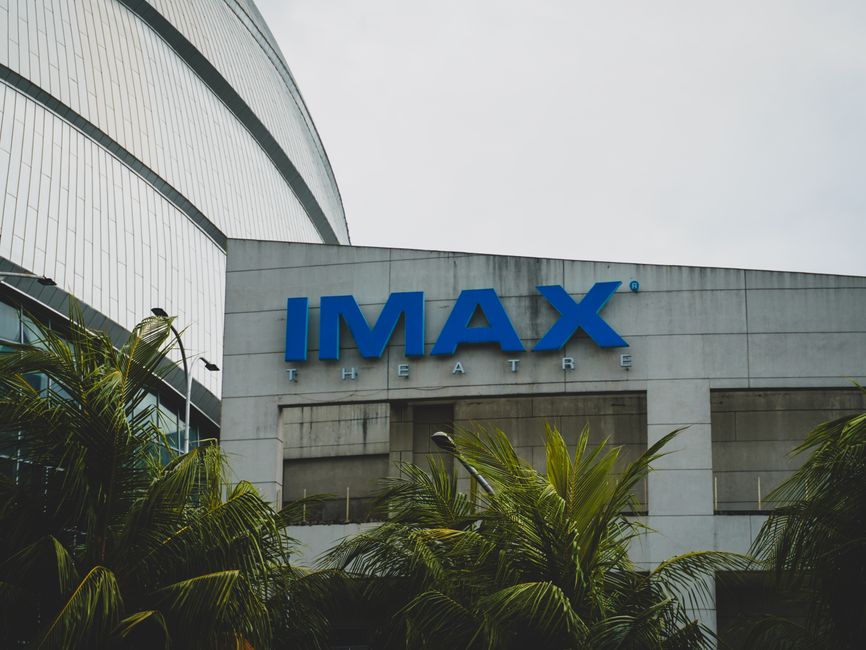 Interior of an IMAX movie theater with a large screen