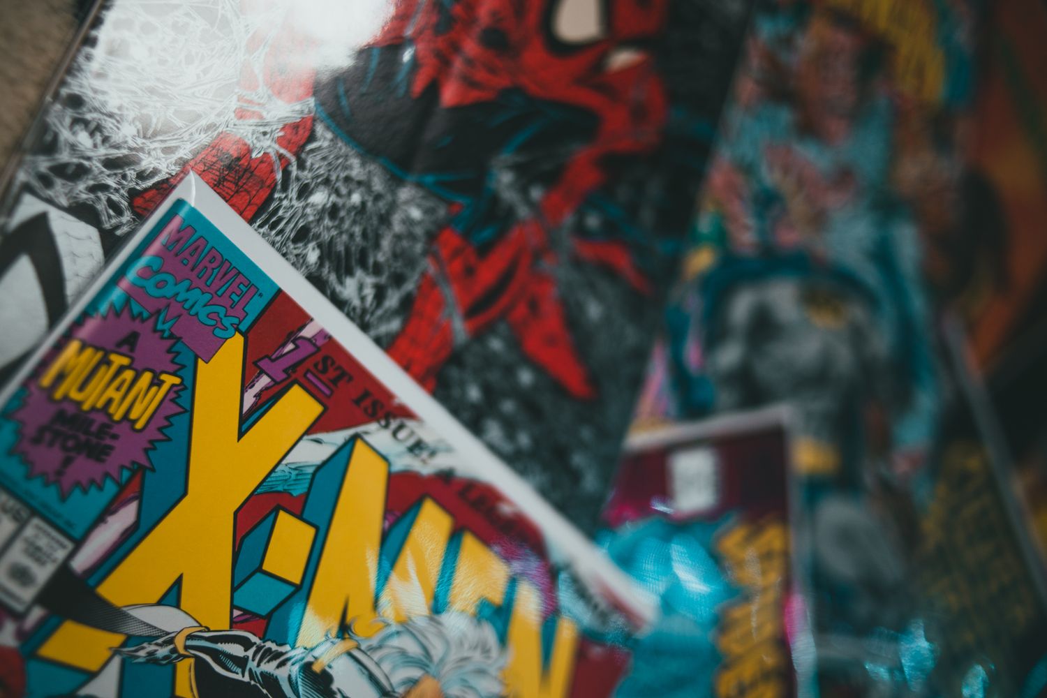A close-up view of superhero comic book covers