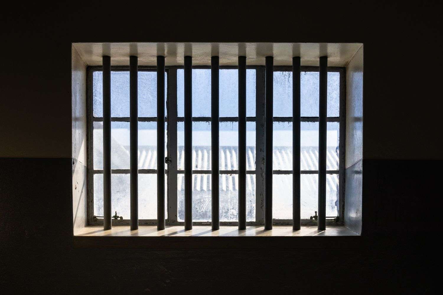 Bars inside a prison cell