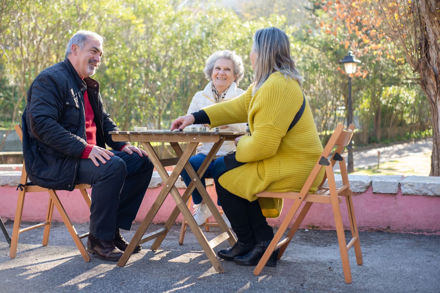 People smiling together in a friendly community setting