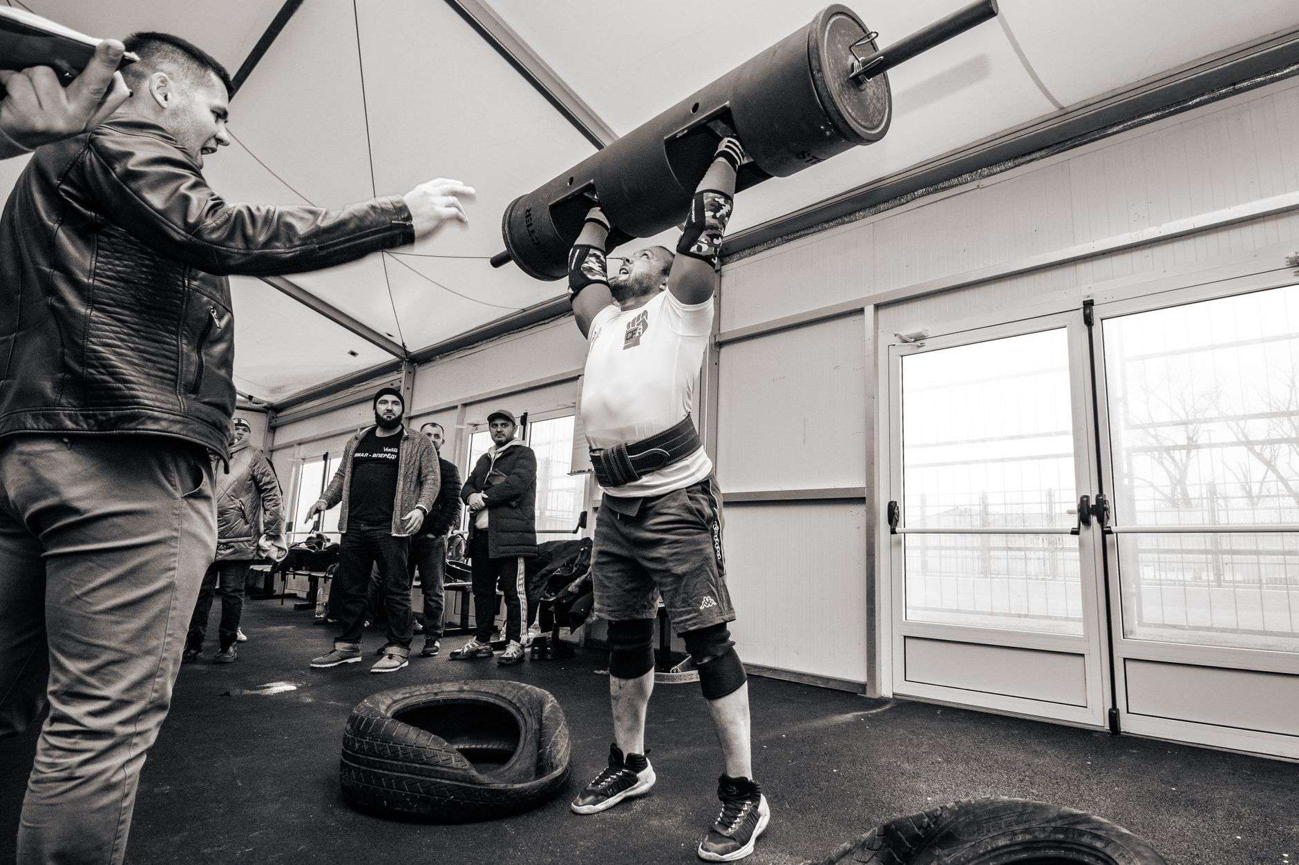 Strength athlete competing in a strongman event