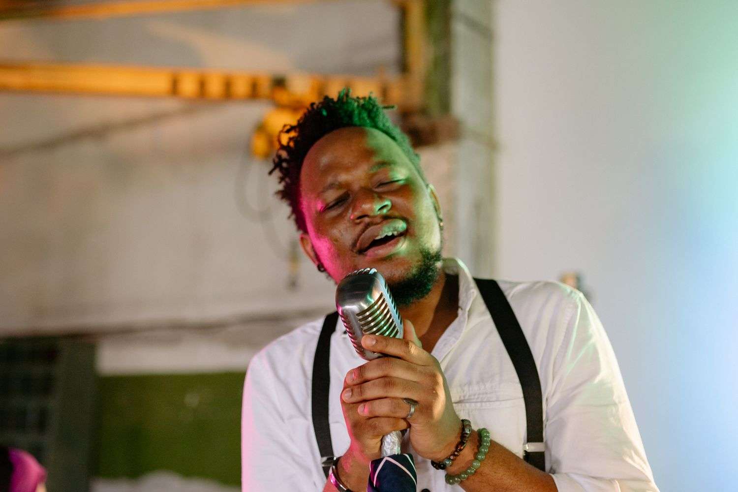 A soul singer performs on stage with her band