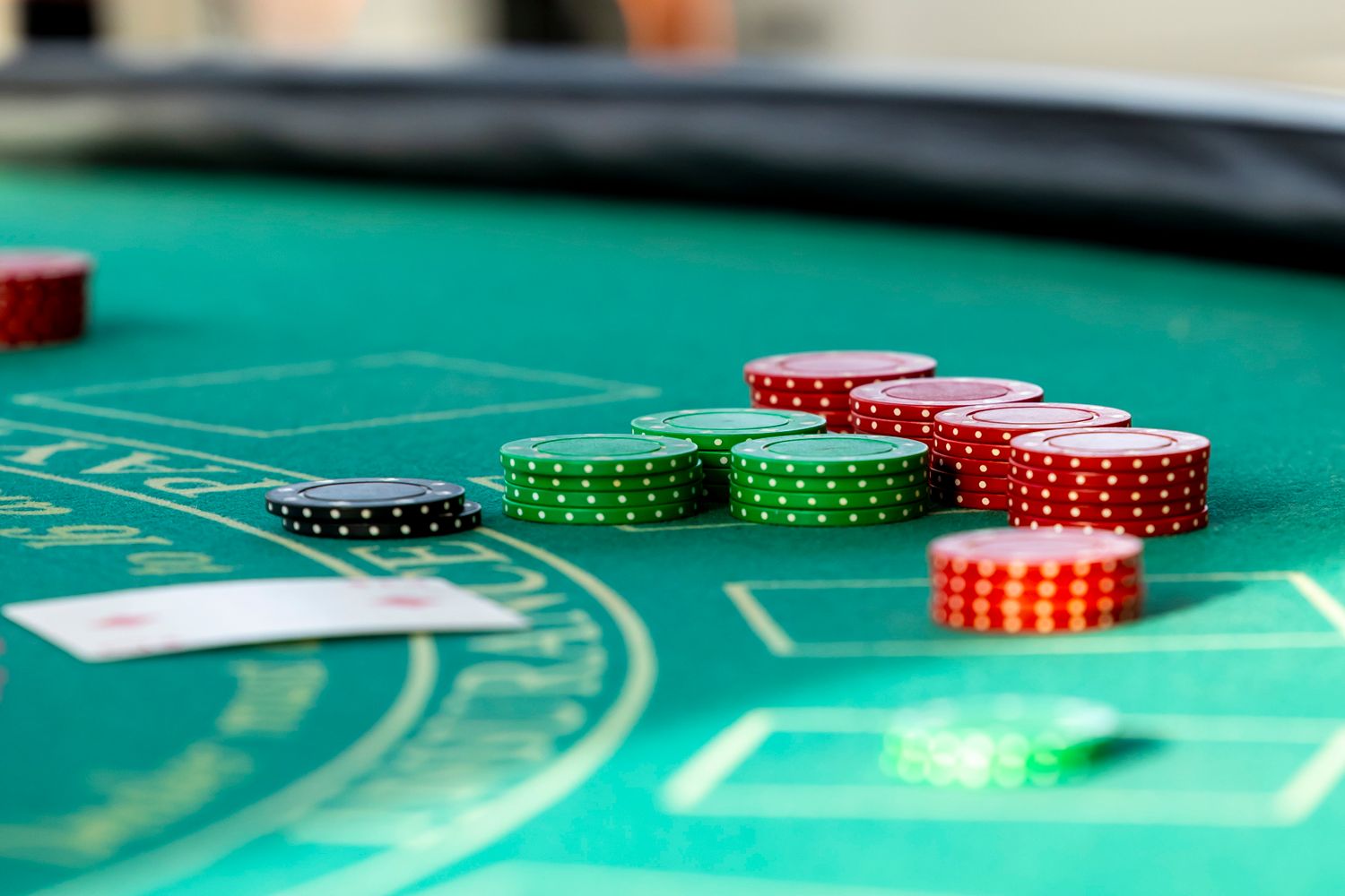 Playing cards and chips on a casino-style fundraiser table