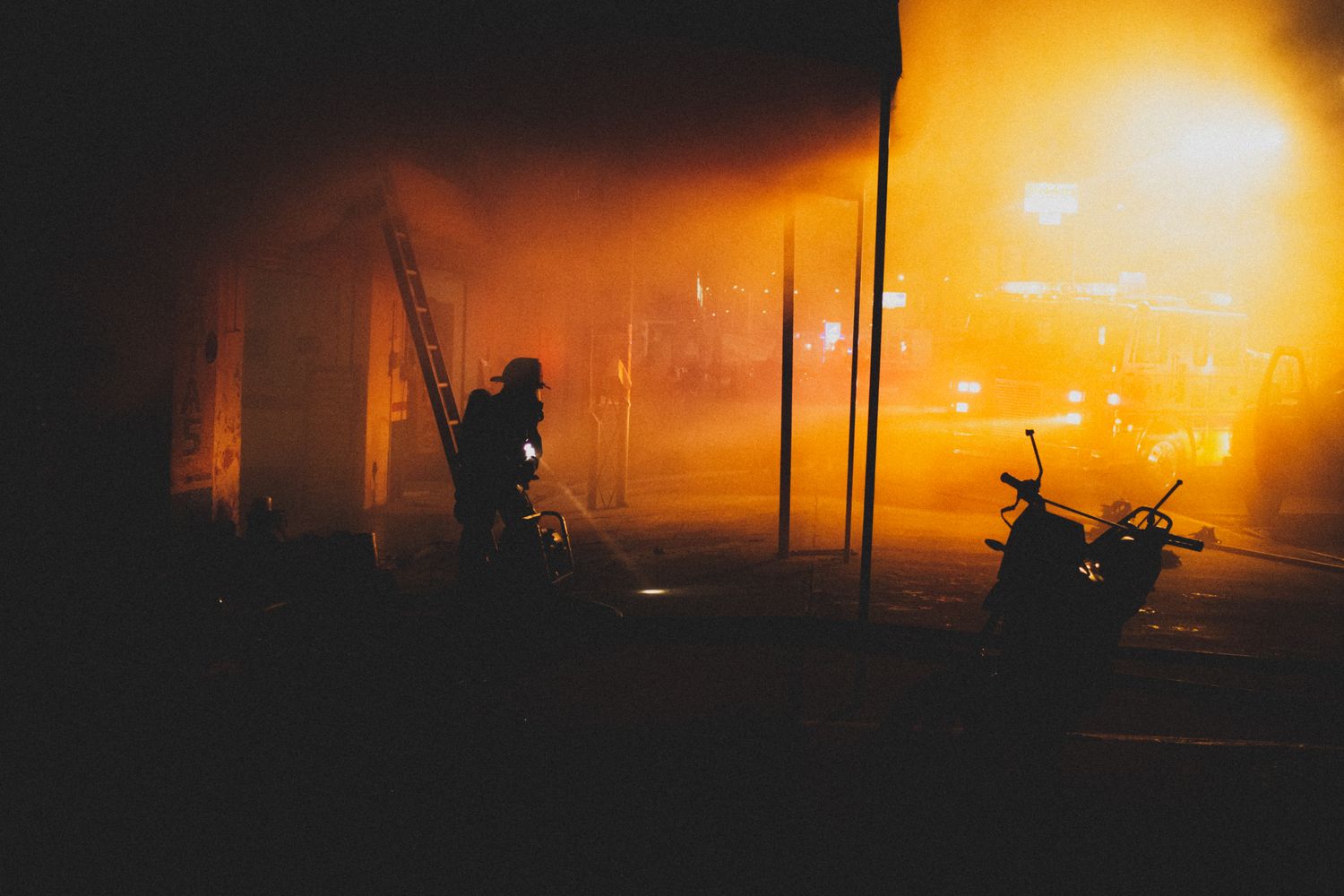 Firefighters investigating a commercial building fire in Mobile