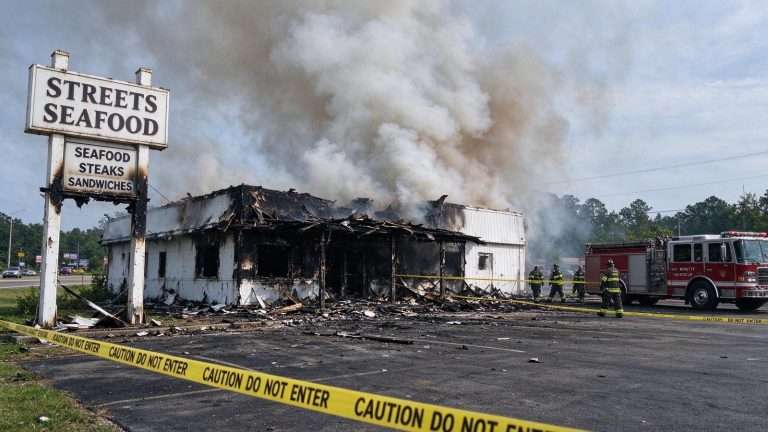 Illustration for the news story: ‘Watched Our Whole Livelihood Burn Up’: Fire Destroys Beloved Bay Minette Restaurant Street’s Seafood