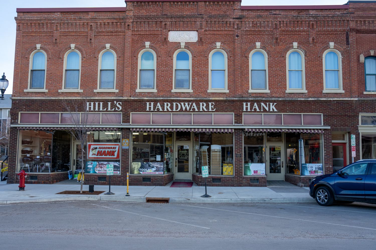 A small business storefront along a small-town main street