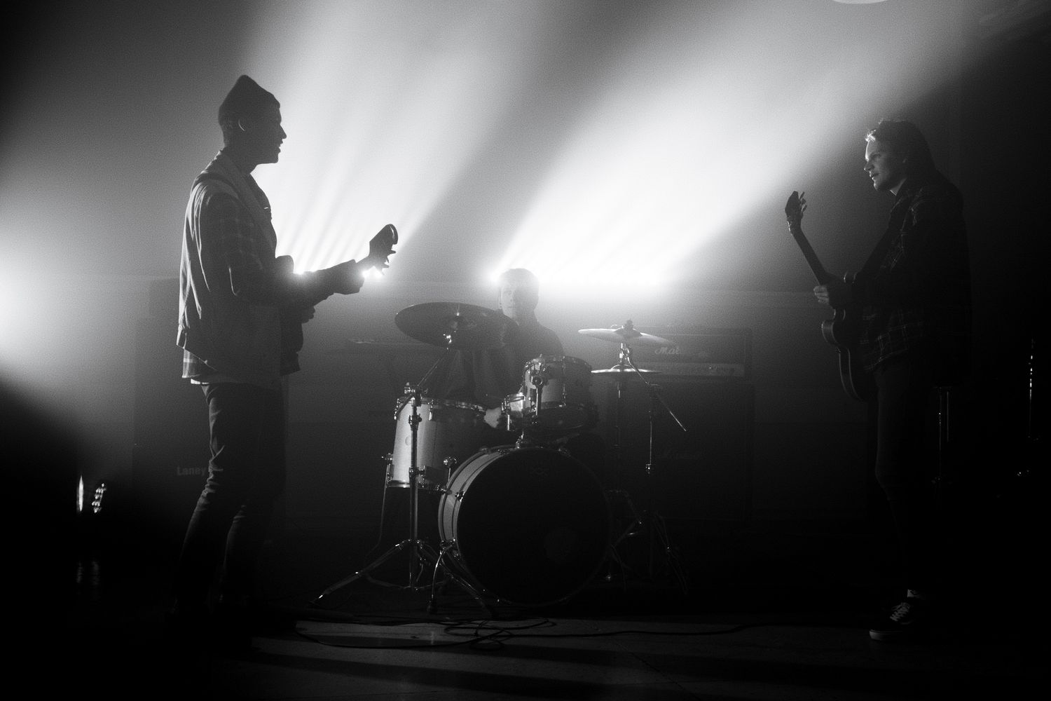 Indie rock band performing live in concert
