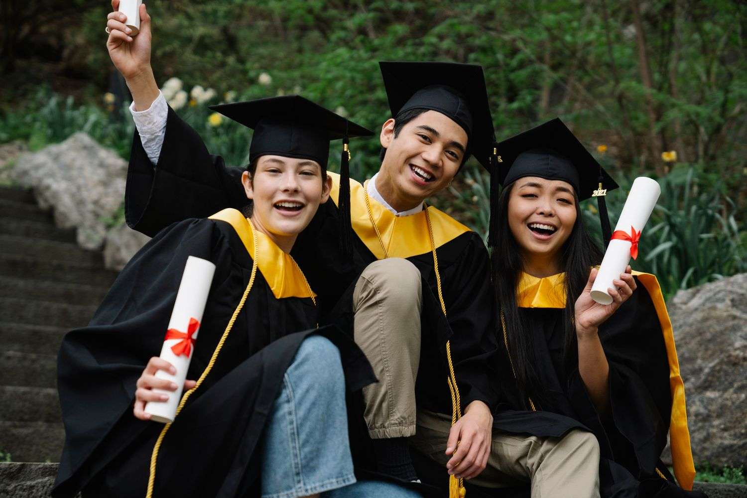 A smiling high school senior celebrating a scholarship award