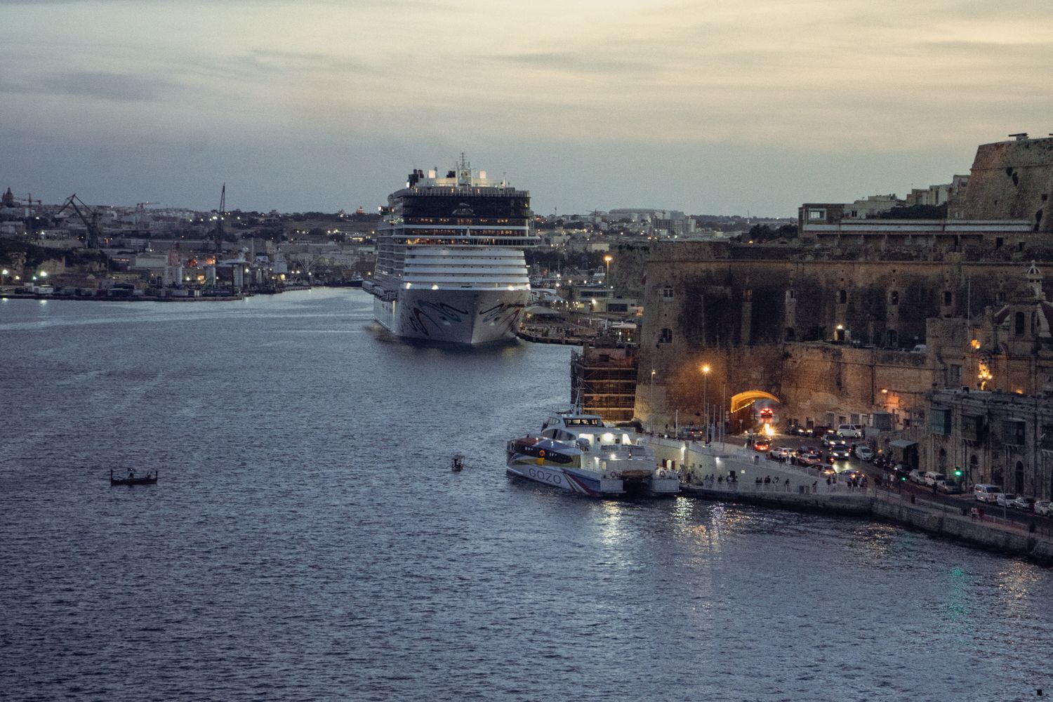Large cruise ship departing from an Alabama port terminal