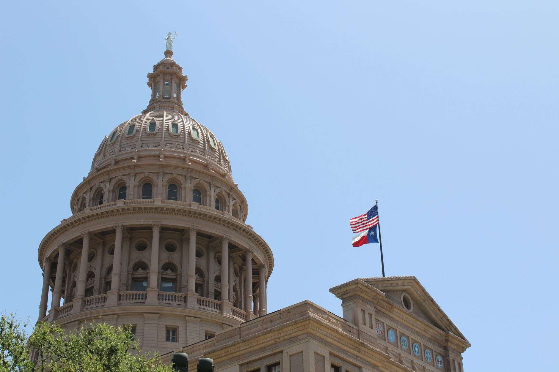 American flag flying near a government building