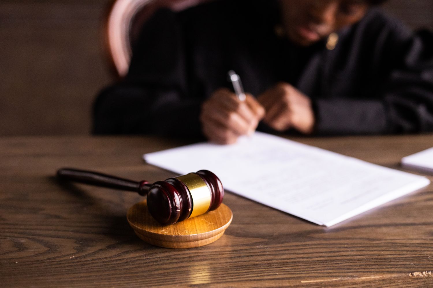 Gavel and legal documents representing criminal charges