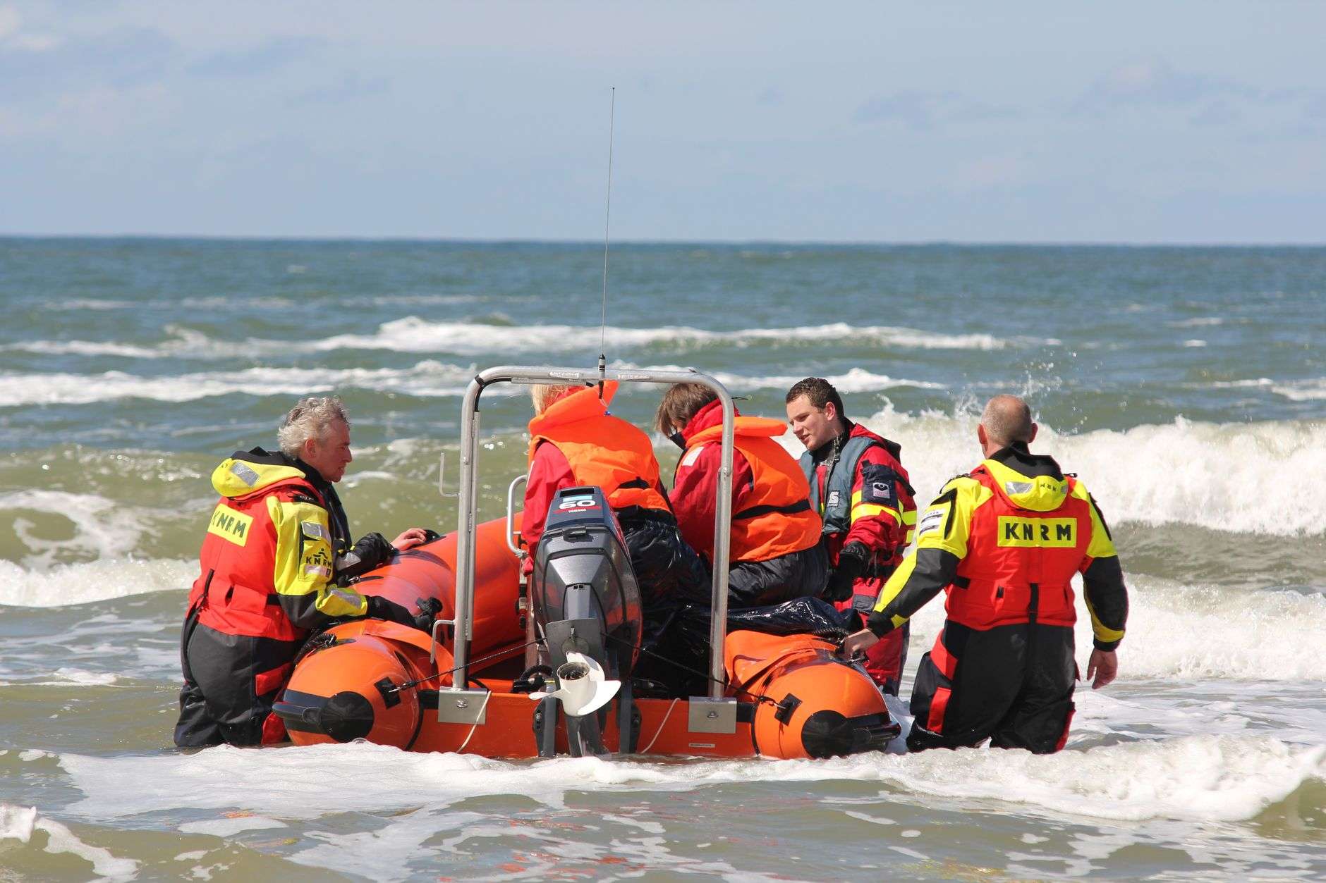A Coast Guard vessel patrolling open water during a search operation