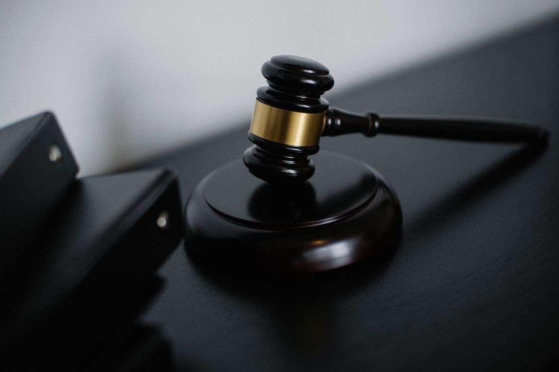 Courthouse pillars and scales of justice