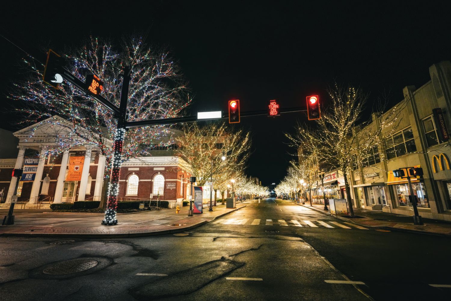 Strings of holiday lights hung overhead along Dauphin Street in downtown Mobile