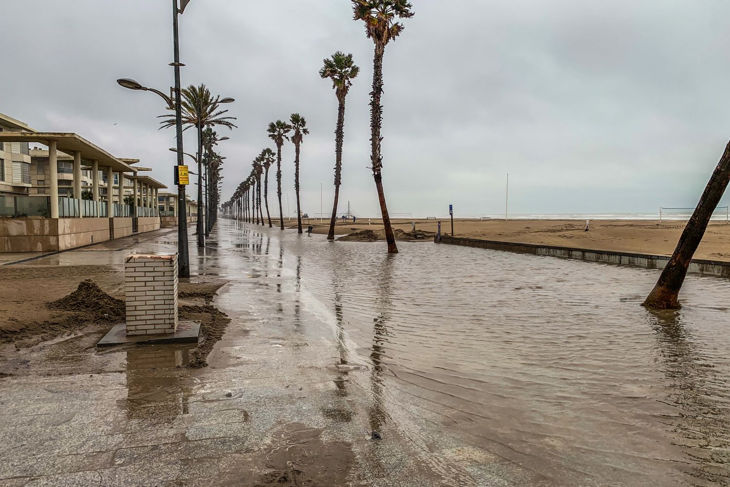 Water covers a road on Dauphin Island's west end ahead of Tropical Storm Barry