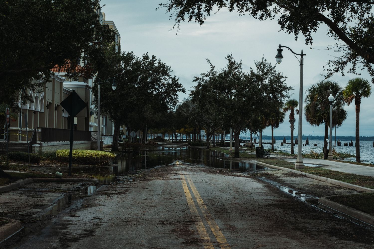 Saltwater flooding on a coastal road at Dauphin Island's west end