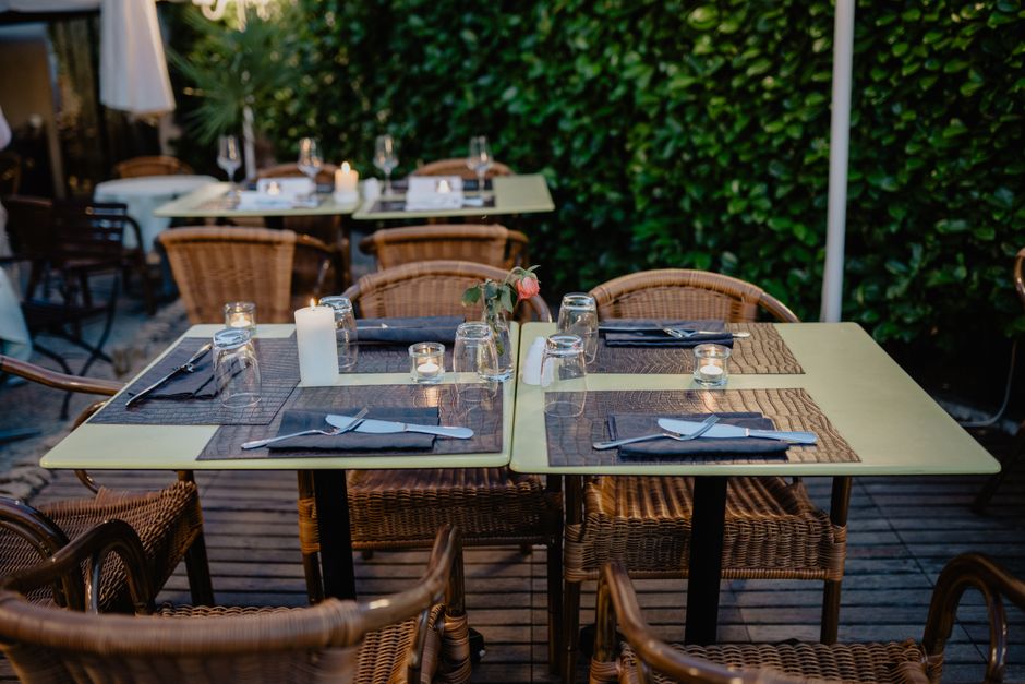 An elegantly set dining table at a downtown Mobile restaurant