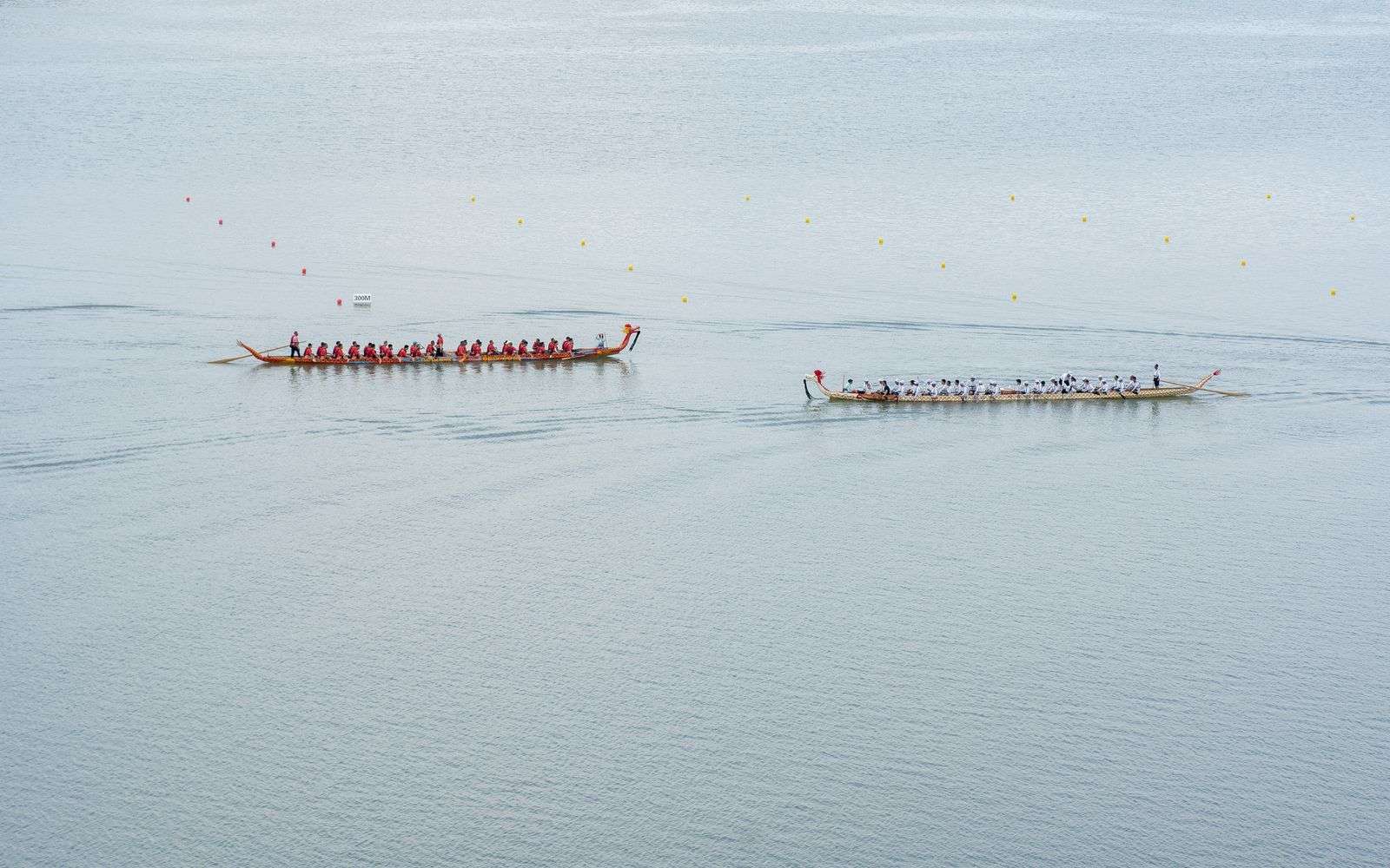 Colorful dragon boat racing on the water