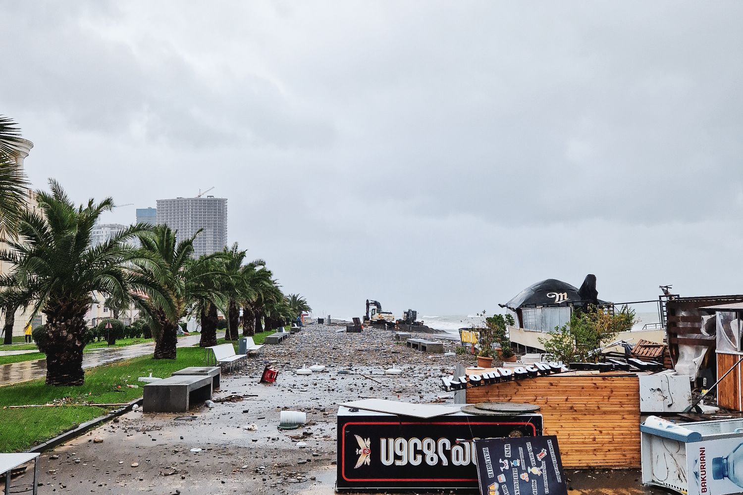 Storm debris and recovery work along the Alabama coast after a hurricane