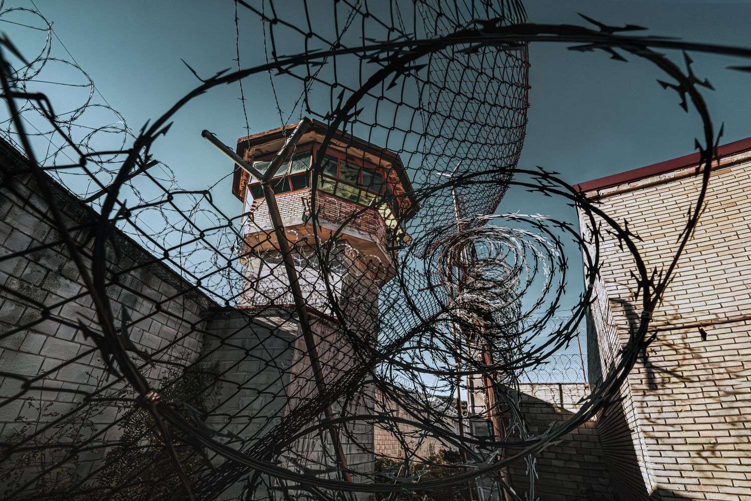 A correctional facility perimeter fence