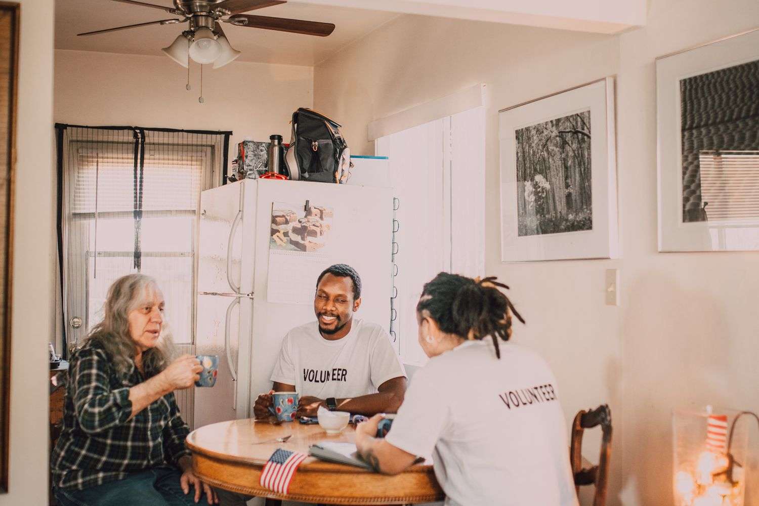 A community gathers indoors for a Mobile family equality fundraiser