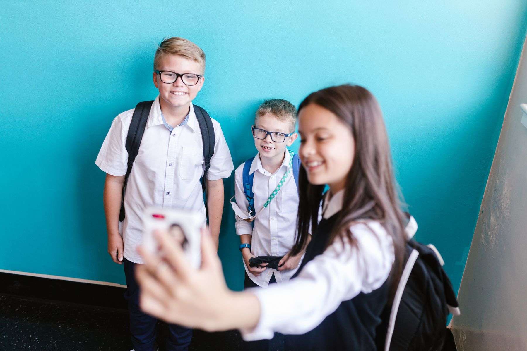 Group of happy students posing together on their first day back to school