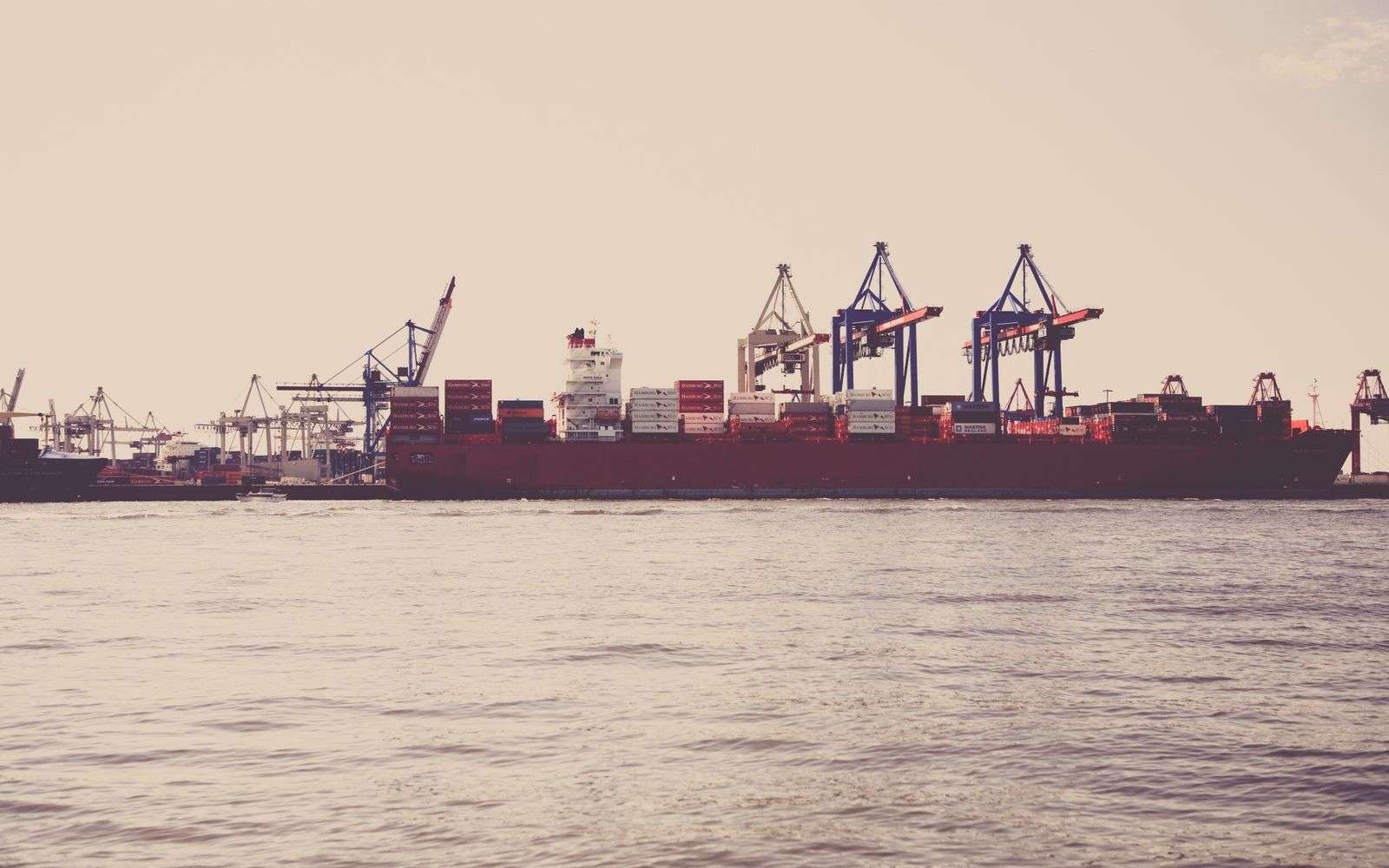 Shipping containers stacked at a port facility