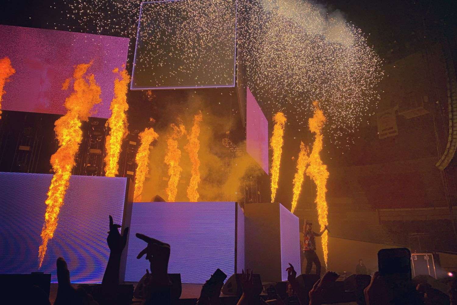 The Flaming Lips performing live with colorful stage visuals