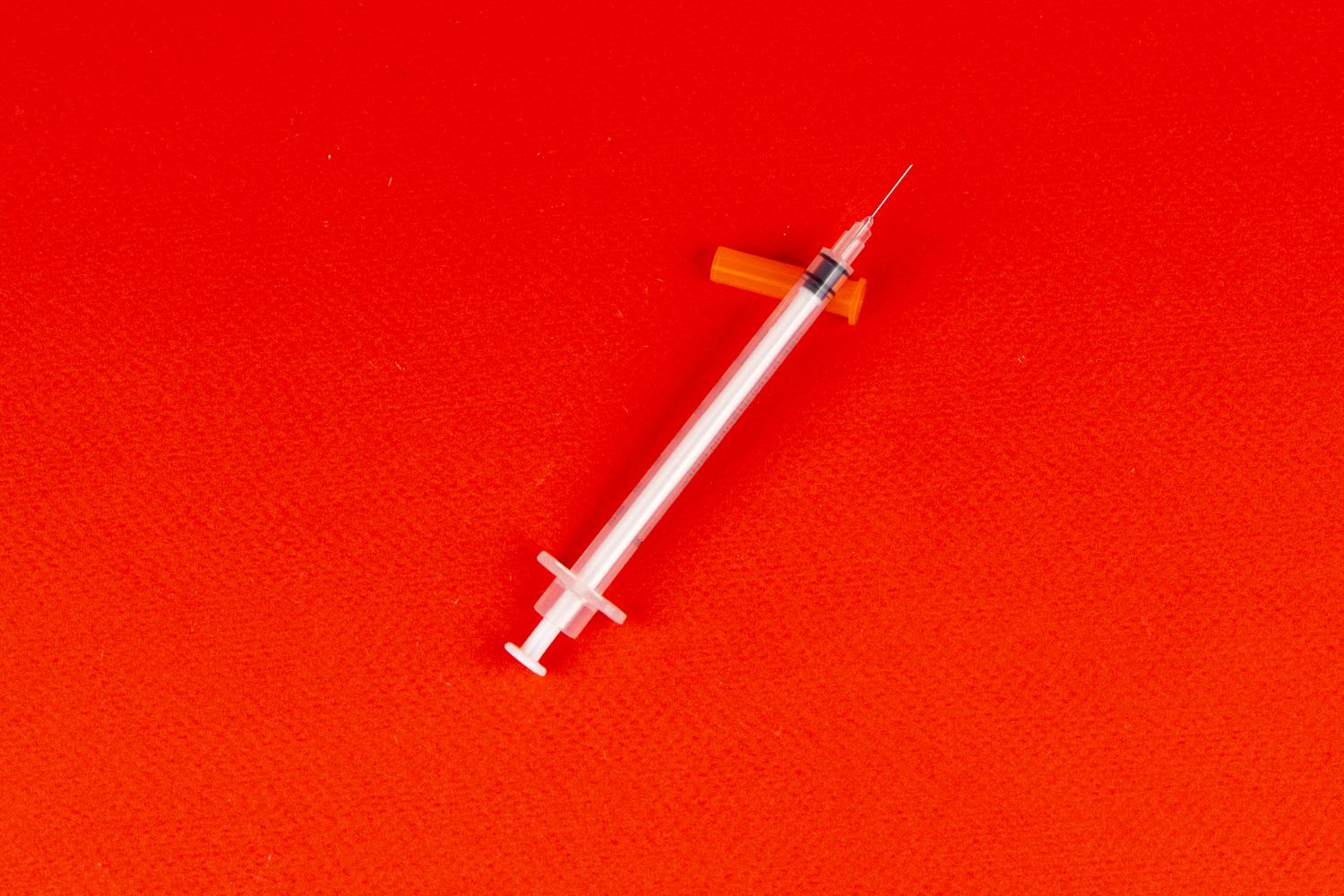 A syringe and vial of influenza vaccine