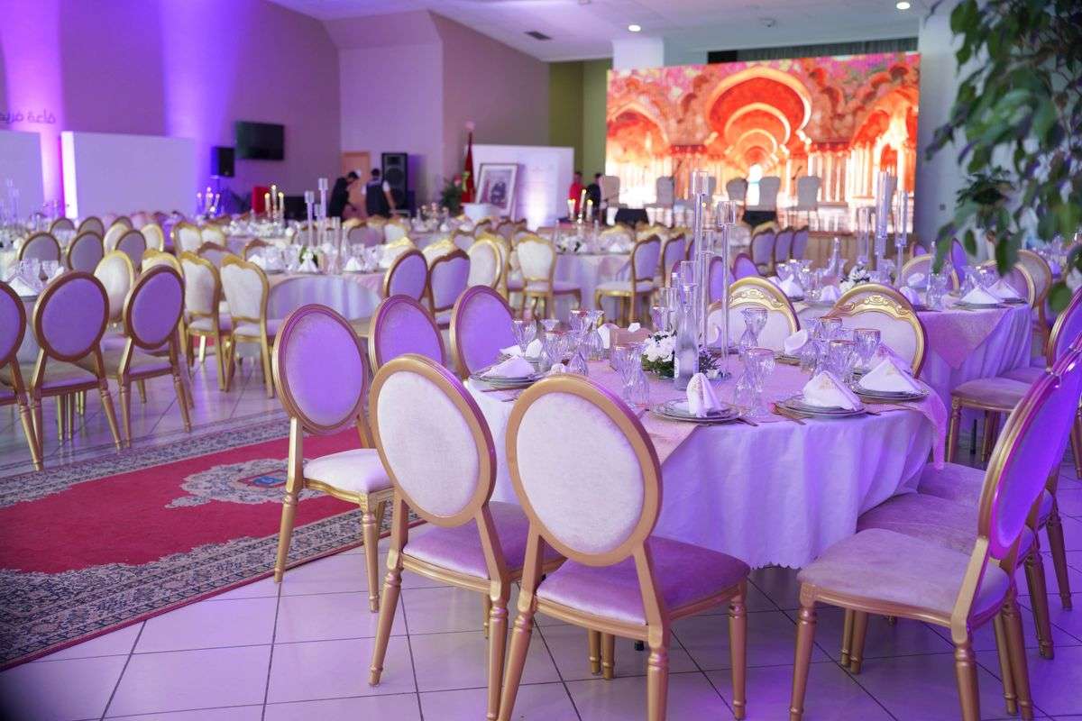 Banquet hall with tables arranged for a formal charity dinner event