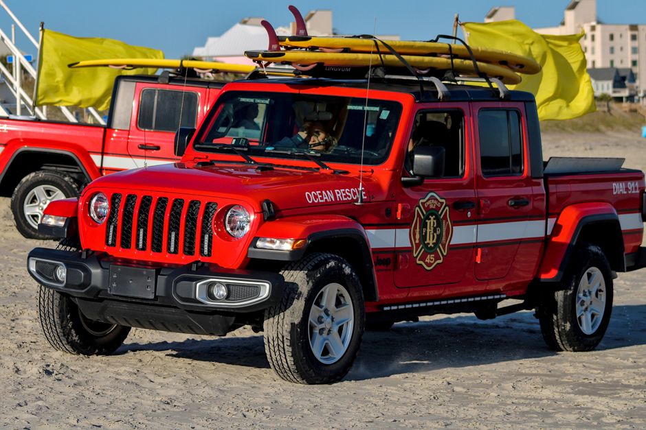 A lineup of Jeeps at a beachside festival in Gulf Shores, Alabama