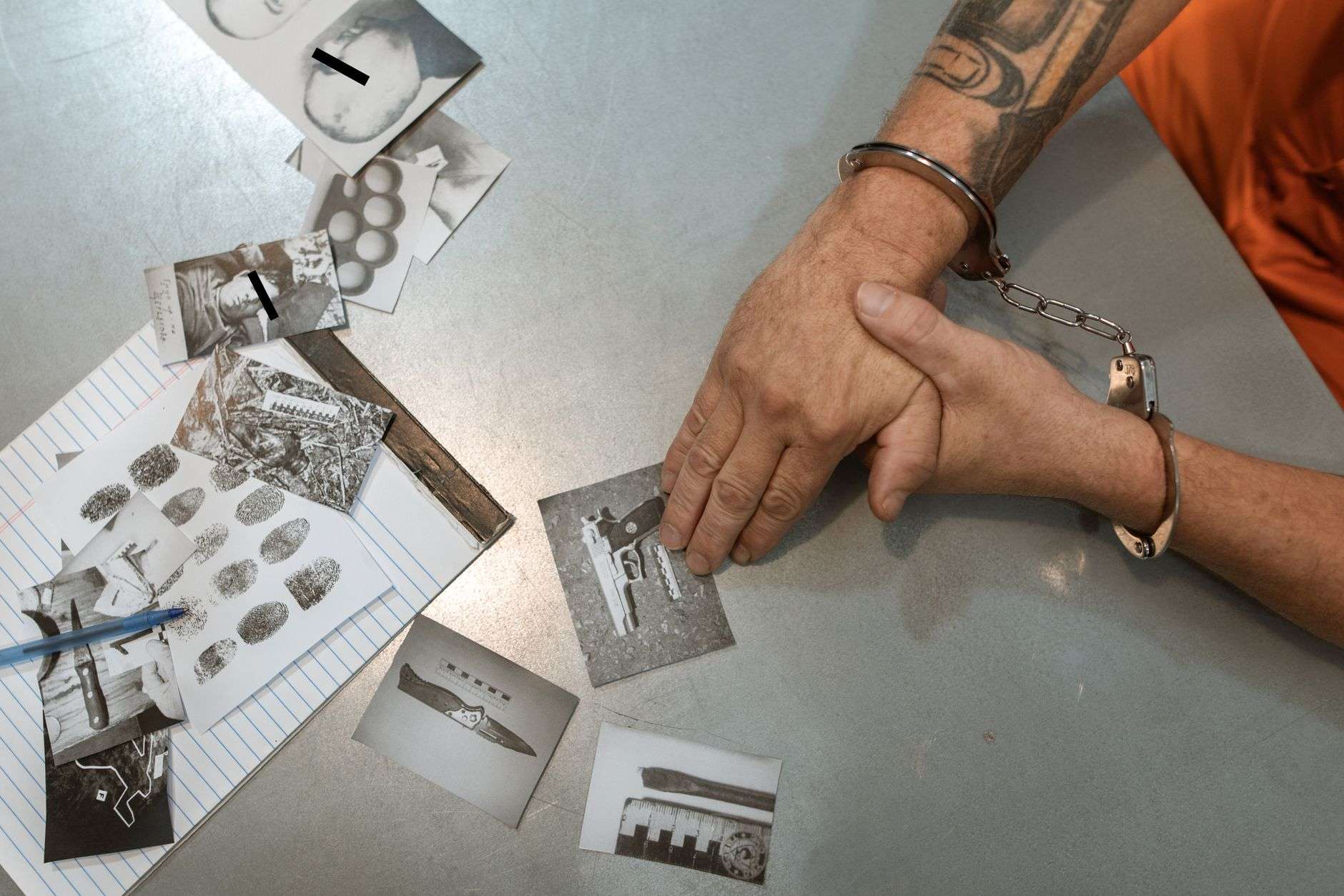 A pair of handcuffs resting on a table