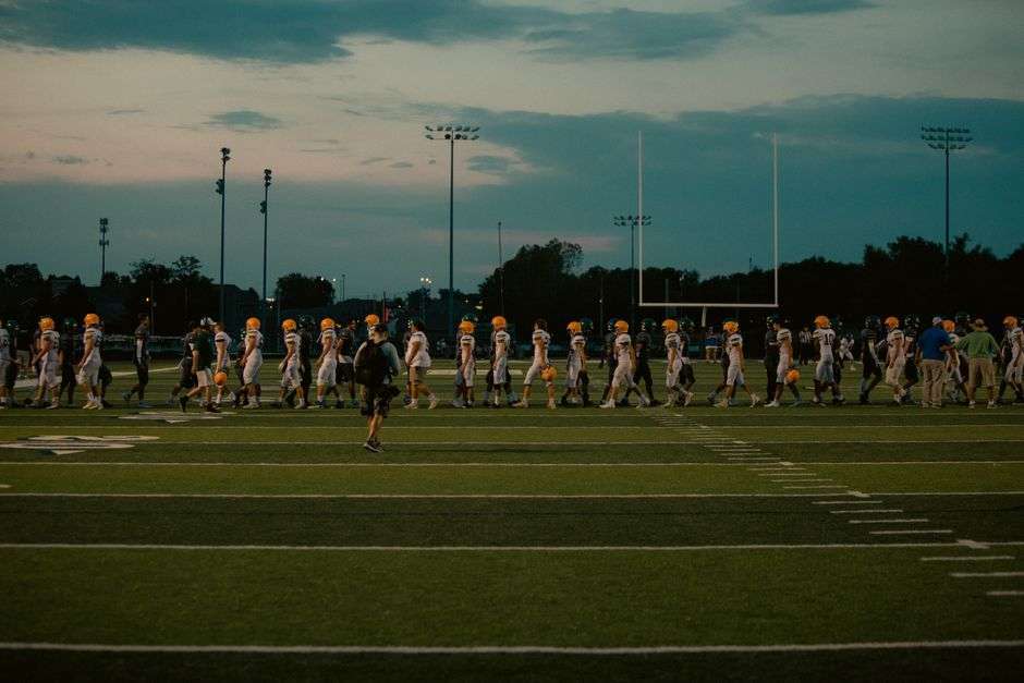 High school football stadium under the lights