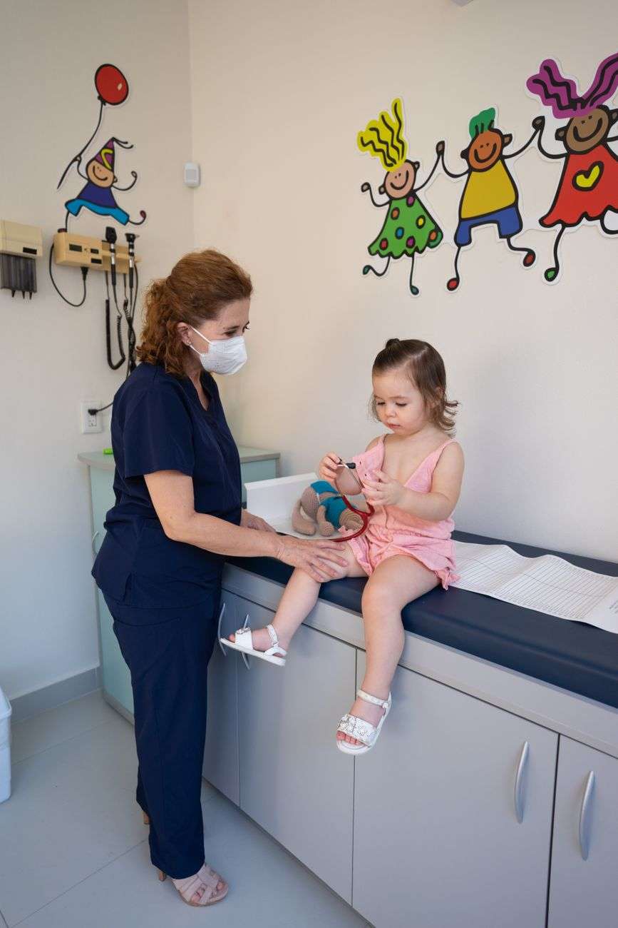 A child receiving care in a hospital setting