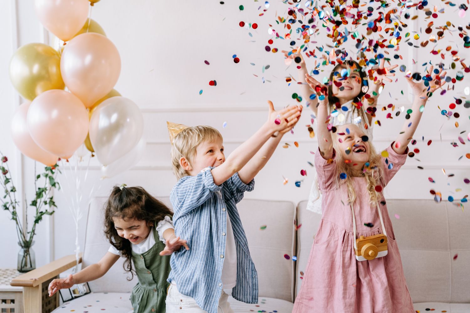 Kids celebrating a daytime New Year's event on the Alabama coast
