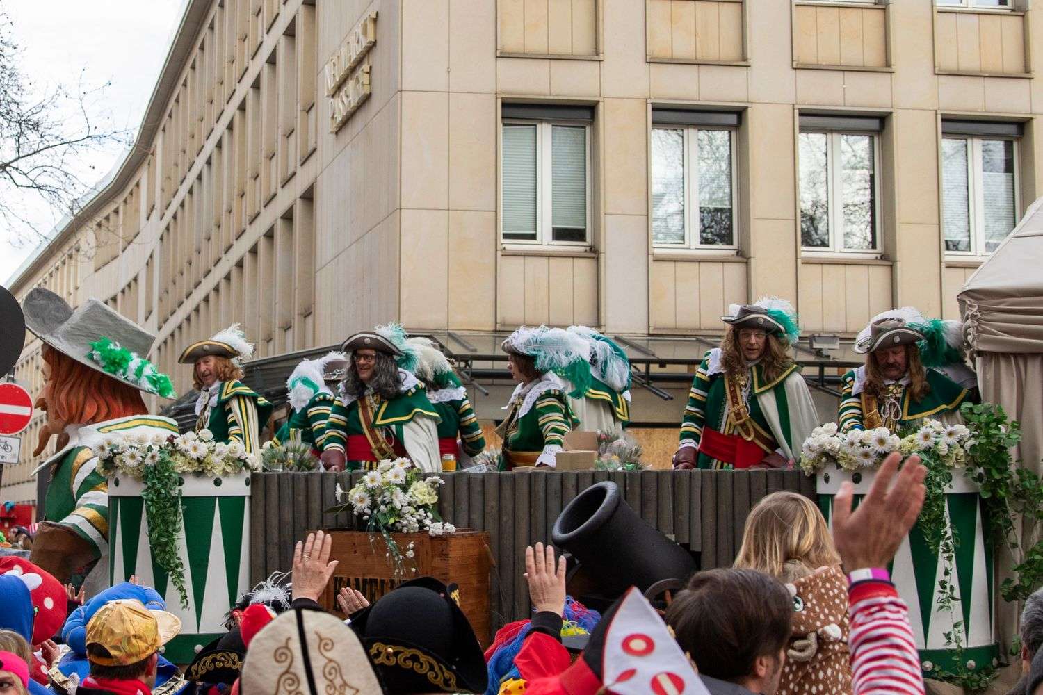 Mardi Gras parade floats moving down a city street