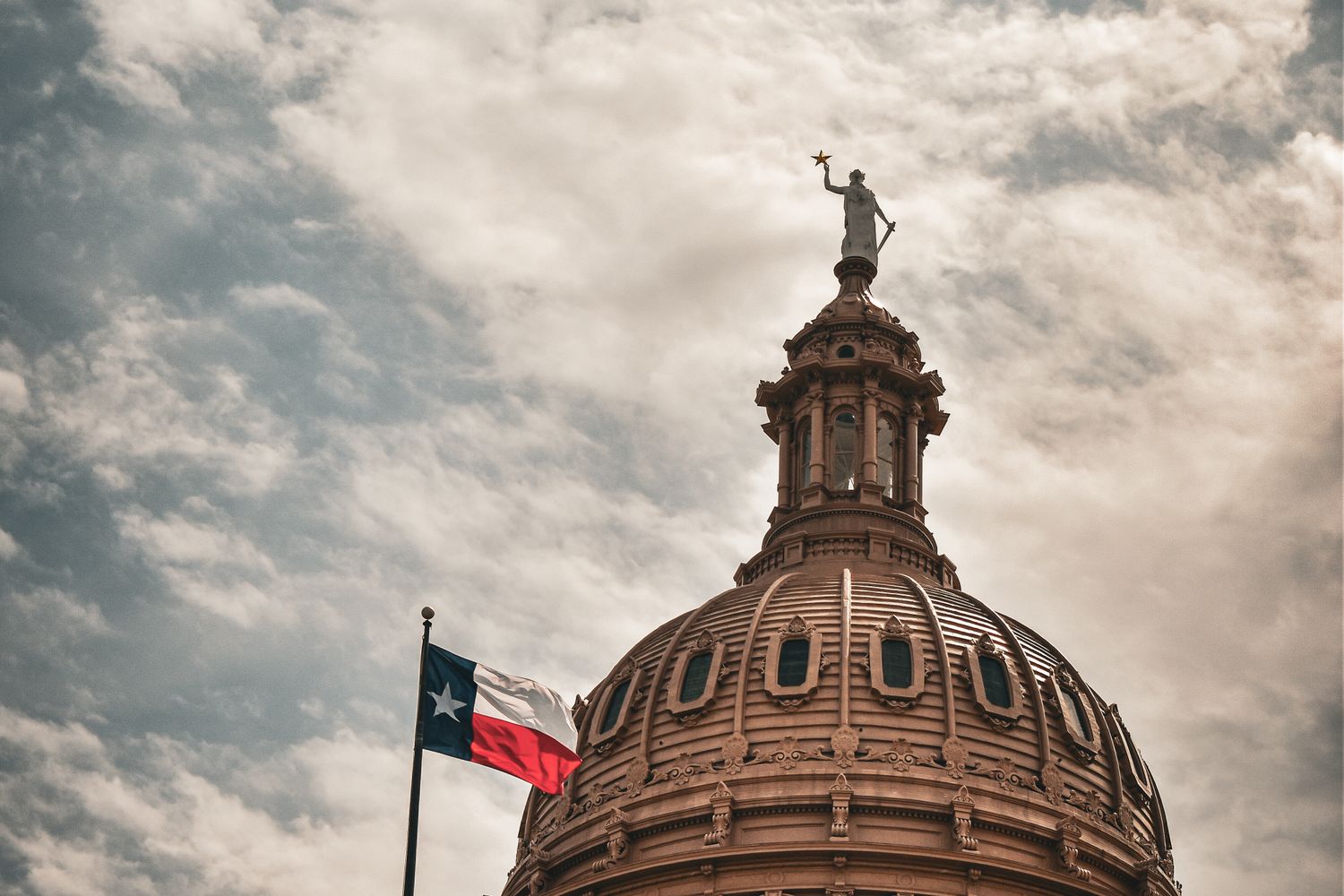 An American flag in front of a public building during campaign season