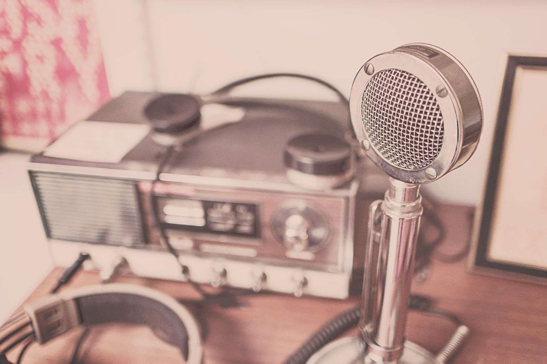 Vintage radio equipment with headphones, representing amateur radio hobby equipment